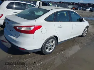 2014 Ford Focus SE with VIN 1FADP3F20EL150757, listed as a IAAI auction lot 41984703 with 171,603 mi miles. Bid and sale history available at carsss.com. Image 4.