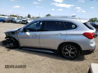 2018 BMW X1 sDrive28i with VIN WBXHU7C38J3H42948, listed as a Copart auction lot 52061793 with 26,991 mi miles. Bid and sale history available at carsss.com. Image 2.