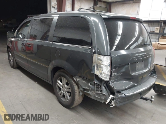 2011 Dodge Grand Caravan Crew with VIN 2D4RN5DG9BR683020, listed as a IAAI auction lot 42150221 with 200,730 mi miles and . Bid and sale history available at DreamBid. Image 3.