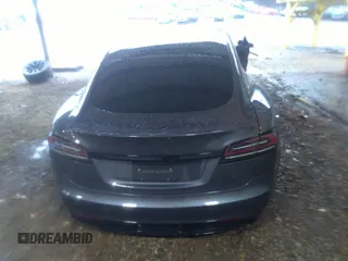 2022 Tesla Model S with VIN 5YJSA1E57NF484158, listed as a IAAI auction lot 41531574 with 16,079 mi miles and . Bid and sale history available at DreamBid. Image 16.