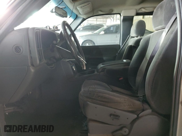 2003 Chevrolet Silverado 1500 with VIN 2GCEK19T731176670, listed as a Copart auction lot 79548164 with 228,014 mi miles and Salvage Title. Bid and sale history available at carsss.com. Image 7.