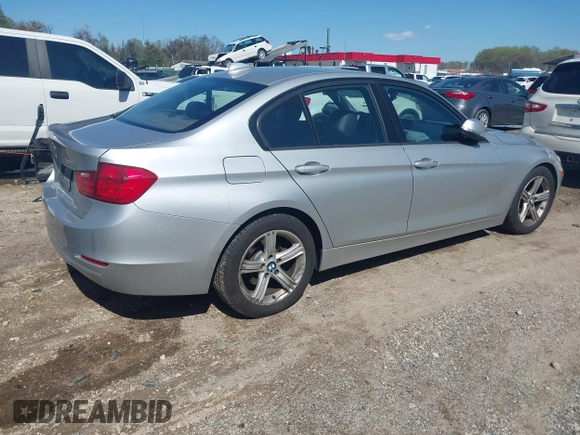 2013 BMW 3 Series 328i with VIN WBA3C1G52DNR44660, listed as a IAAI auction lot 41994277 with 165,151 mi miles and . Bid and sale history available at carsss.com. Image 4.