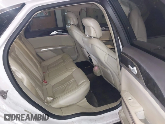 2014 Lincoln MKZ with VIN 3LN6L2J92ER836146, listed as a IAAI auction lot 41583343 with 130,613 mi miles. Bid and sale history available at carsss.com. Image 8.