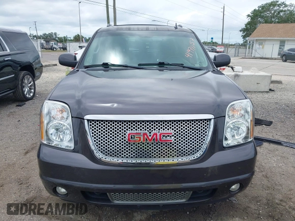 2011 GMC Yukon XL Denali with VIN 1GKS1MEF8BR279940, listed as a IAAI auction lot 41971157 with 218,597 mi miles. Bid and sale history available at carsss.com. Image 12.