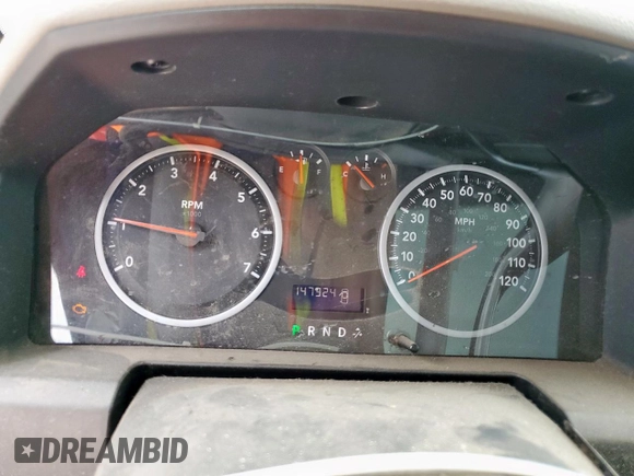 2012 Ram 1500 Express with VIN 3C6JD6AT4CG201072, listed as a Copart auction lot 60130655 with 147,324 mi miles and Salvage title. Bid and sale history available at DreamBid. Image 9.