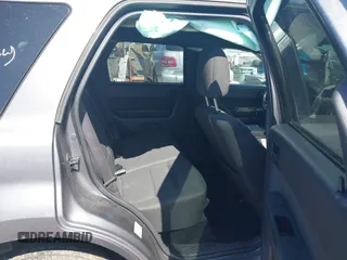 2011 Ford Escape XLT with VIN 1FMCU0D79BKB79697, listed as a IAAI auction lot 41265677 with 138,026 mi miles. Bid and sale history available at carsss.com. Image 8.