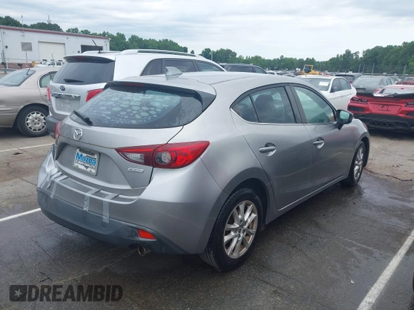 2014 Mazda 3 i Grand Touring z VIN 3MZBM1M73EM110150, wystawiony jako IAAI lot #42260717 z przebiegiem 104 240 mil mil oraz . Historia ofert i sprzedaży dostępna na DreamBid. Obrazek 4.