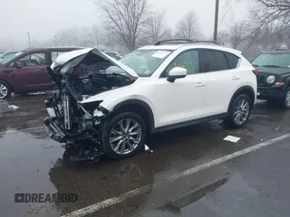 2020 Mazda CX-5 Grand Touring with VIN JM3KFBDMXL0785865, listed as a IAAI auction lot 41567177 with 64,519 mi miles. Bid and sale history available at carsss.com. Image 17.