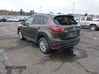 2016 Mazda CX-5 Touring with VIN JM3KE4CY5G0695242, listed as a IAAI auction lot 41795135 with 195,162 mi miles. Bid and sale history available at carsss.com. Image 3.