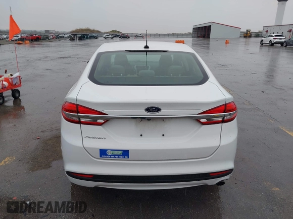 2017 Ford Fusion S with VIN 3FA6P0G72HR337120, listed as a IAAI auction lot 42173384 with 133,320 mi miles and . Bid and sale history available at DreamBid. Image 16.