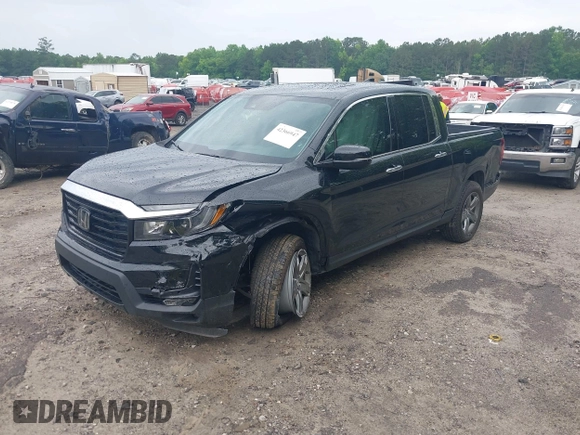 2023 Honda Ridgeline RTL-E with VIN 5FPYK3F77PB052828, listed as a IAAI auction lot 42366947 with 24,658 mi miles and . Bid and sale history available at DreamBid. Image 2.