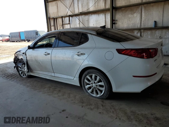 2014 Kia Optima EX z VIN 5XXGN4A71EG275210, wystawiony jako Copart lot #58095515 z przebiegiem 113 030 mil mil oraz Szkoda całkowita • Salvage title. Historia ofert i sprzedaży dostępna na DreamBid. Obrazek 2.