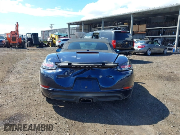 2018 Porsche 718 Boxster z VIN WP0CA2A8XJS210766, wystawiony jako IAAI lot #41617239 z przebiegiem 55 336 mil mil oraz . Historia ofert i sprzedaży dostępna na DreamBid. Obrazek 16.