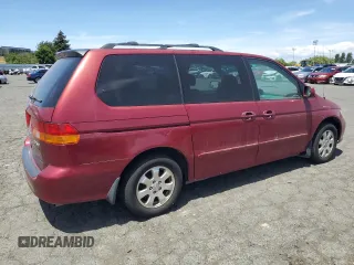 2004 Honda Odyssey EX-L with VIN 5FNRL18014B031578, listed as a Copart auction lot 56938795 with 241,085 mi miles and Salvage title. Bid and sale history available at DreamBid. Image 3.