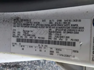 2011 Ford Fiesta SE with VIN 3FADP4EJ3BM231633, listed as a IAAI auction lot 41915946 with 130,891 mi miles. Bid and sale history available at carsss.com. Image 9.