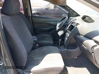 2008 Toyota Yaris with VIN JTDBT923381218886, listed as a IAAI auction lot 42149424 with 171,219 mi miles. Bid and sale history available at carsss.com. Image 5.