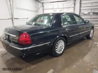 2009 Mercury Grand Marquis LS with VIN 2MEHM75V39X602084, listed as a IAAI auction lot 41615859 with 102,051 mi miles. Bid and sale history available at carsss.com. Image 4.