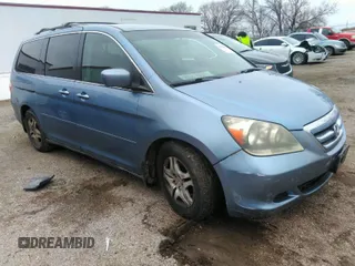 2006 Honda Odyssey EX with VIN 5FNRL38436B086177, listed as a IAAI auction lot 41219596 with 123,455 mi miles. Bid and sale history available at carsss.com. Image 1.