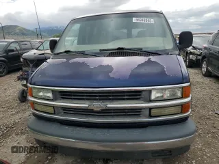 2001 Chevrolet Chevy Van z VIN 1GBFG15M411225075, wystawiony jako Copart lot #56948945 z przebiegiem 201 558 mil mil oraz Tytuł czysty. Historia ofert i sprzedaży dostępna na DreamBid. Obrazek 5.