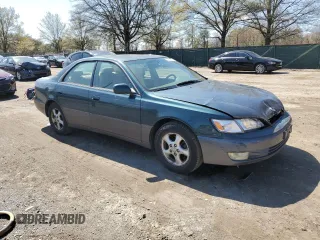 1997 Lexus ES 300 Luxury Sport Sdn with VIN JT8BF22G9V0050351, listed as a Copart auction lot 52082575 with 201,831 mi miles and Salvage Title. Bid and sale history available at carsss.com. Image 4.
