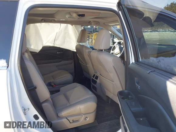 2020 Honda Pilot Elite with VIN 5FNYF6H09LB039247, listed as a IAAI auction lot 41364383 with 56,865 mi miles and . Bid and sale history available at DreamBid. Image 8.