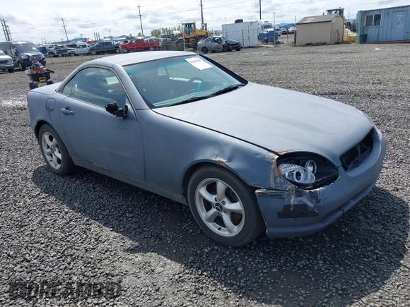 2003 Mercedes-Benz SLK 320 with VIN WDBKK65F63F282132, listed as a IAAI auction lot 41965580 with 166,115 mi miles and . Bid and sale history available at DreamBid. Image 1.