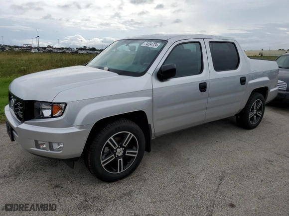 2014 Honda Ridgeline Sport with VIN 5FPYK1F76EB005713, listed as a Copart auction lot 74694724 with 73,039 mi miles and Salvage Title. Bid and sale history available at carsss.com. Image 1.