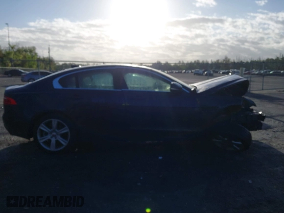 2017 Jaguar XE 25t Prestige with VIN SAJAE4BG2HA953713, listed as a IAAI auction lot 41657172 with 93,083 mi miles. Bid and sale history available at carsss.com. Image 13.