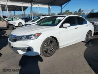 2017 Honda Accord Sedan Sport SE with VIN 1HGCR2F1XHA159579, listed as a IAAI auction lot 41667239 with 156,393 mi miles. Bid and sale history available at carsss.com. Image 2.
