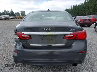 2015 Infiniti Q70 with VIN JN1BY1ARXFM562111, listed as a IAAI auction lot 42473521 with 123,212 mi miles and . Bid and sale history available at DreamBid. Image 16.
