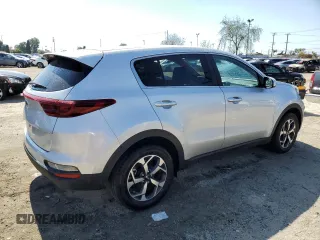 2021 Kia Sportage LX with VIN KNDPM3AC4M7863040, listed as a Copart auction lot 52040075 with 13,233 mi miles and Salvage Title. Bid and sale history available at DreamBid. Image 3.