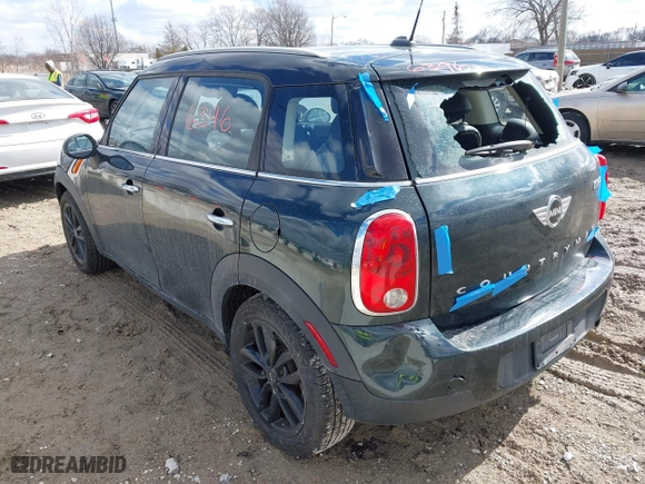 2013 MINI Cooper Countryman with VIN WMWZB3C58DWM09440, listed as a IAAI auction lot 41696396 with 52,930 mi miles. Bid and sale history available at carsss.com. Image 3.