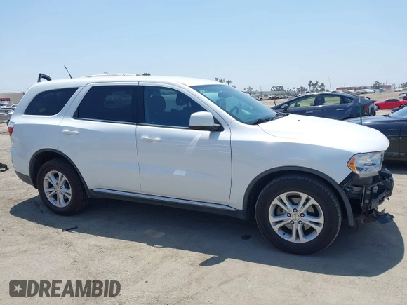2013 Dodge Durango SXT with VIN 1C4RDHAG0DC669587, listed as a IAAI auction lot 42599143 with 126,748 mi miles and . Bid and sale history available at DreamBid. Image 14.