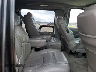 2003 GMC Savana z VIN 1GDGG29U031206019, wystawiony jako Copart lot #48920054 z przebiegiem Nie podano mil oraz Szkoda całkowita • Salvage title. Historia ofert i sprzedaży dostępna na DreamBid. Obrazek 11.