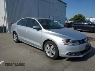 2012 Volkswagen Jetta TDI w/Premium & Nav with VIN 3VWLL7AJ8CM349006, listed as a Copart auction lot 54934995 with 110,596 mi miles and Salvage title. Bid and sale history available at DreamBid. Image 4.