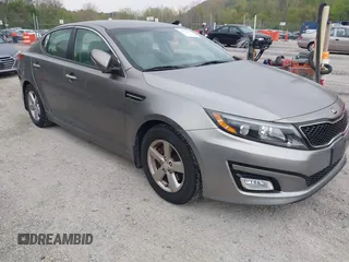 2014 Kia Optima LX with VIN 5XXGM4A73EG277964, listed as a IAAI auction lot 42079663 with 91,009 mi miles. Bid and sale history available at carsss.com. Image 1.