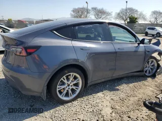 2023 Tesla Model Y Long Range with VIN 7SAYGDEE2PA164405, listed as a Copart auction lot 50085905 with 42,156 mi miles and Salvage Title. Bid and sale history available at DreamBid. Image 3.