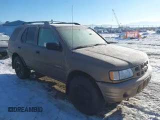 2002 Isuzu Rodeo with VIN 4S2DM58W824320291, listed as a IAAI auction lot 41385761 with 177,441 mi miles. Bid and sale history available at carsss.com. Image 1.