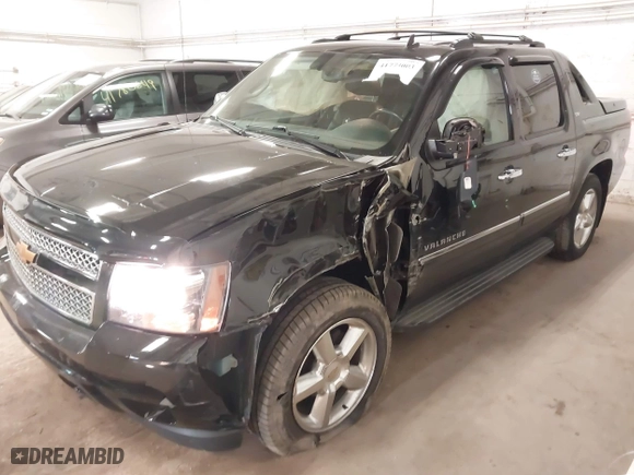 2012 Chevrolet Avalanche LTZ with VIN 3GNTKGE7XCG151943, listed as a IAAI auction lot 41774003 with 123,512 mi miles. Bid and sale history available at carsss.com. Image 6.