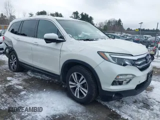 2017 Honda Pilot EX-L with VIN 5FNYF6H52HB015651, listed as a IAAI auction lot 41538814 with 121,433 mi miles and . Bid and sale history available at DreamBid. Image 1.