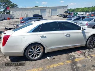 2014 Cadillac XTS Luxury with VIN 2G61M5S32E9310910, listed as a IAAI auction lot 41978298 with Not provided miles and . Bid and sale history available at DreamBid. Image 13.