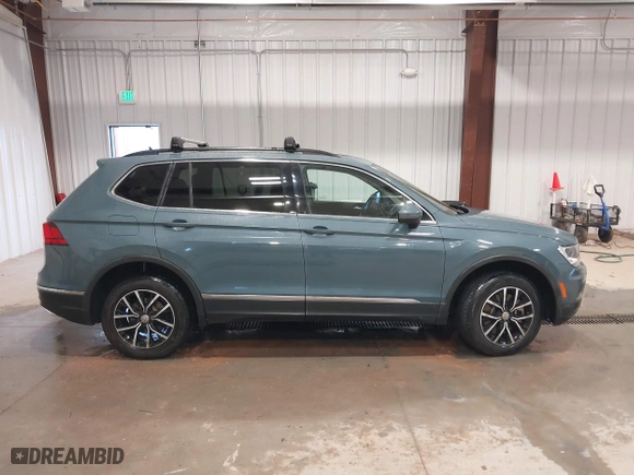 2021 Volkswagen Tiguan SE with VIN 3VV2B7AX6MM077337, listed as a IAAI auction lot 41345637 with 62,989 mi miles. Bid and sale history available at carsss.com. Image 14.