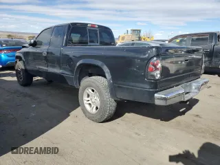 2004 Dodge Dakota SLT with VIN 1D7HG42N44S749267, listed as a Copart auction lot 89313825 with 215,047 mi miles and Salvage Title. Bid and sale history available at carsss.com. Image 2.