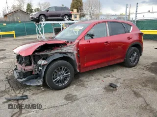 2021 Mazda CX-5 Touring z VIN JM3KFBCM0M0448544, wystawiony jako Copart lot #48553825 z przebiegiem 141 674 mil mil oraz Szkody całkowita. Historia ofert i sprzedaży dostępna na DreamBid. Obrazek 1.