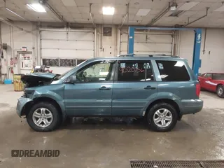 2005 Honda Pilot EX-L with RES with VIN 2HKYF18615H515907, listed as a IAAI auction lot 41520756 with 172,939 mi miles. Bid and sale history available at carsss.com. Image 14.