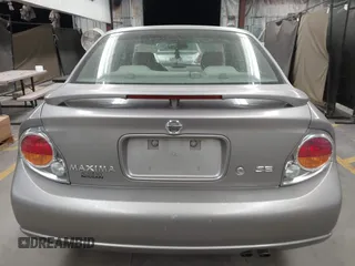 2002 Nissan Maxima GLE with VIN JN1DA31D32T422365, listed as a IAAI auction lot 41644137 with 165,157 mi miles and . Bid and sale history available at DreamBid. Image 16.