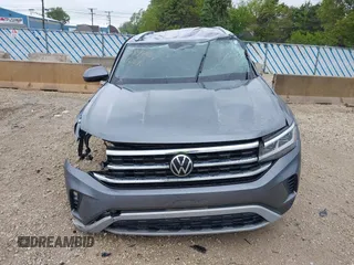 2022 Volkswagen Atlas SE with VIN 1V2LC2CA1NC203536, listed as a IAAI auction lot 42310598 with 28,724 mi miles and . Bid and sale history available at DreamBid. Image 12.