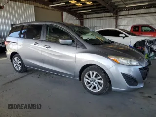 2014 Mazda 5 Sport with VIN JM1CW2BL9E0163445, listed as a Copart auction lot 64772215 with 86,020 mi miles and Salvage title. Bid and sale history available at DreamBid. Image 4.