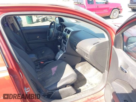 2009 Dodge Caliber SXT with VIN 1B3HB48A89D157414, listed as a IAAI auction lot 42141618 with 175,377 mi miles and . Bid and sale history available at DreamBid. Image 5.