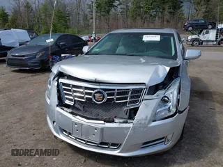 2013 Cadillac XTS Luxury z VIN 2G61P5S33D9170453, wystawiony jako IAAI lot #41928607 z przebiegiem 68 094 mil mil oraz . Historia ofert i sprzedaży dostępna na DreamBid. Obrazek 6.